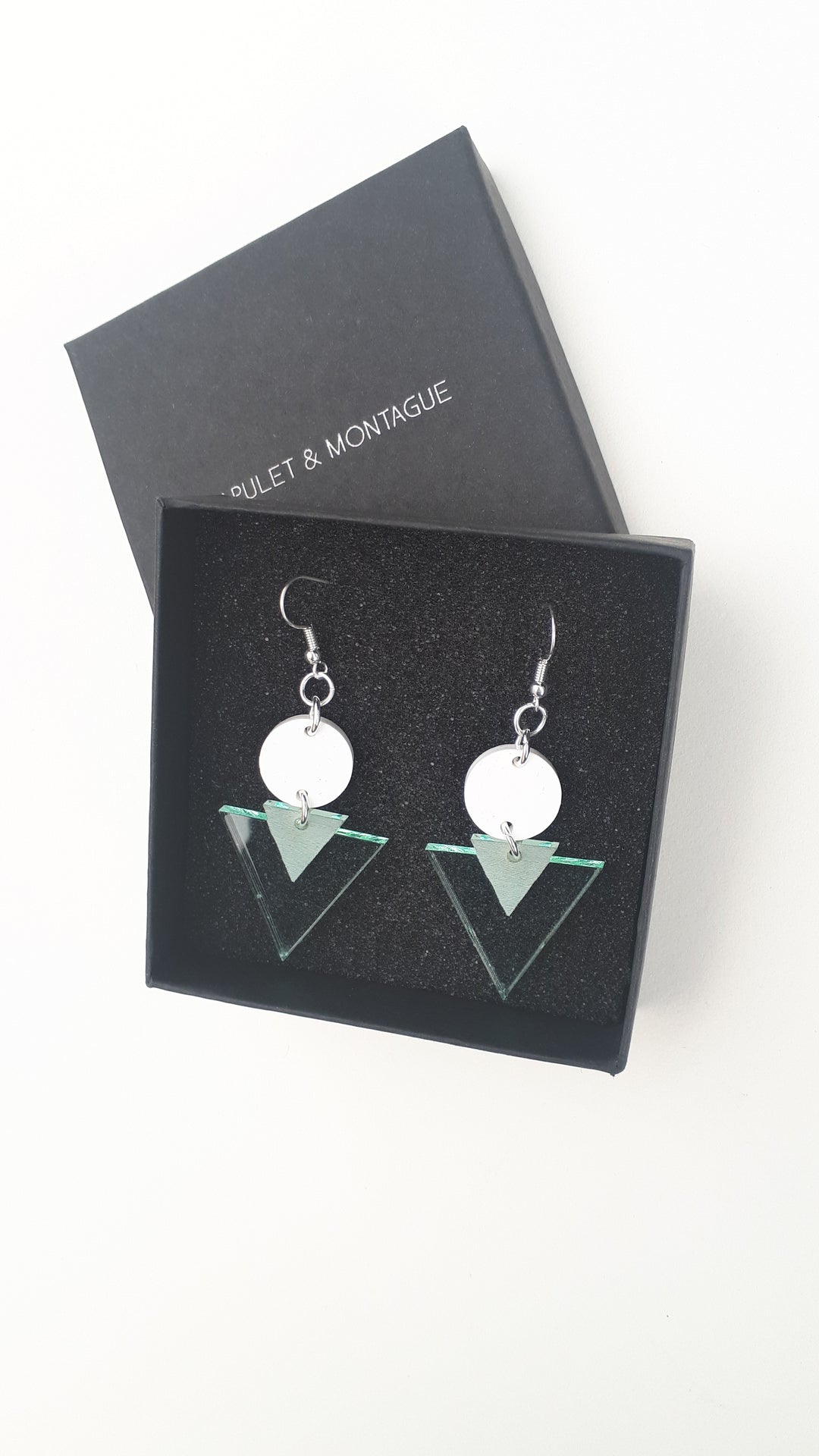 Etched arrow drop earrings designed and made in Ireland by irish brand Capulet and montague