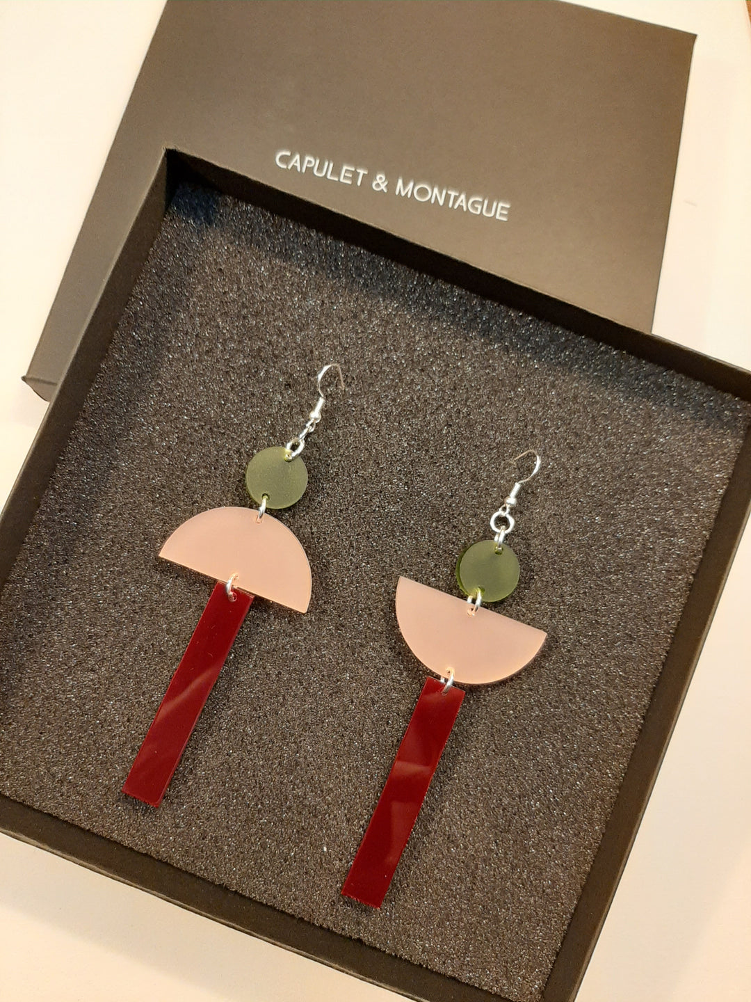 Opposites attract drop earrings designed by irish designer Lisa McCormack of Capulet and montague