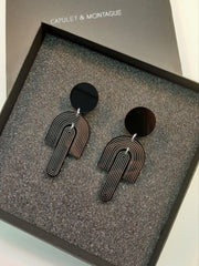 Black arc drop statment earrings designed by irish jewellery jewelry designer Capulet and montague 
