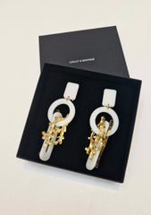 White & gold Charm earrings