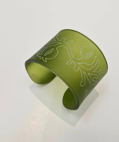 Sculptural Cuff with etched pomegranate in frosted olive